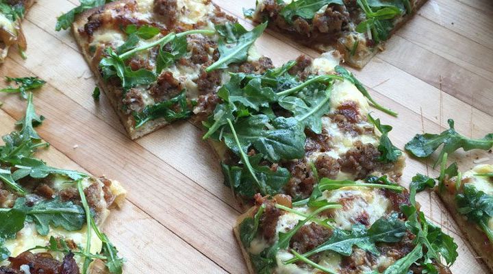 Pizza With Spicy Lamb Tomatoes And Arugula Salad Recipe
